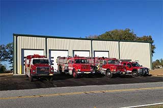 Renegade Steel Building: tan with brown trim, fire station steel building