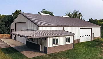 Barndominium with wrap around porch
