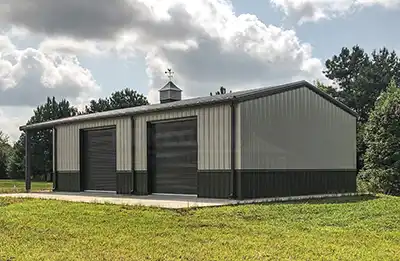 30x65 Renegade building with open bay, gray walls, burnished slate wainscot and trim.