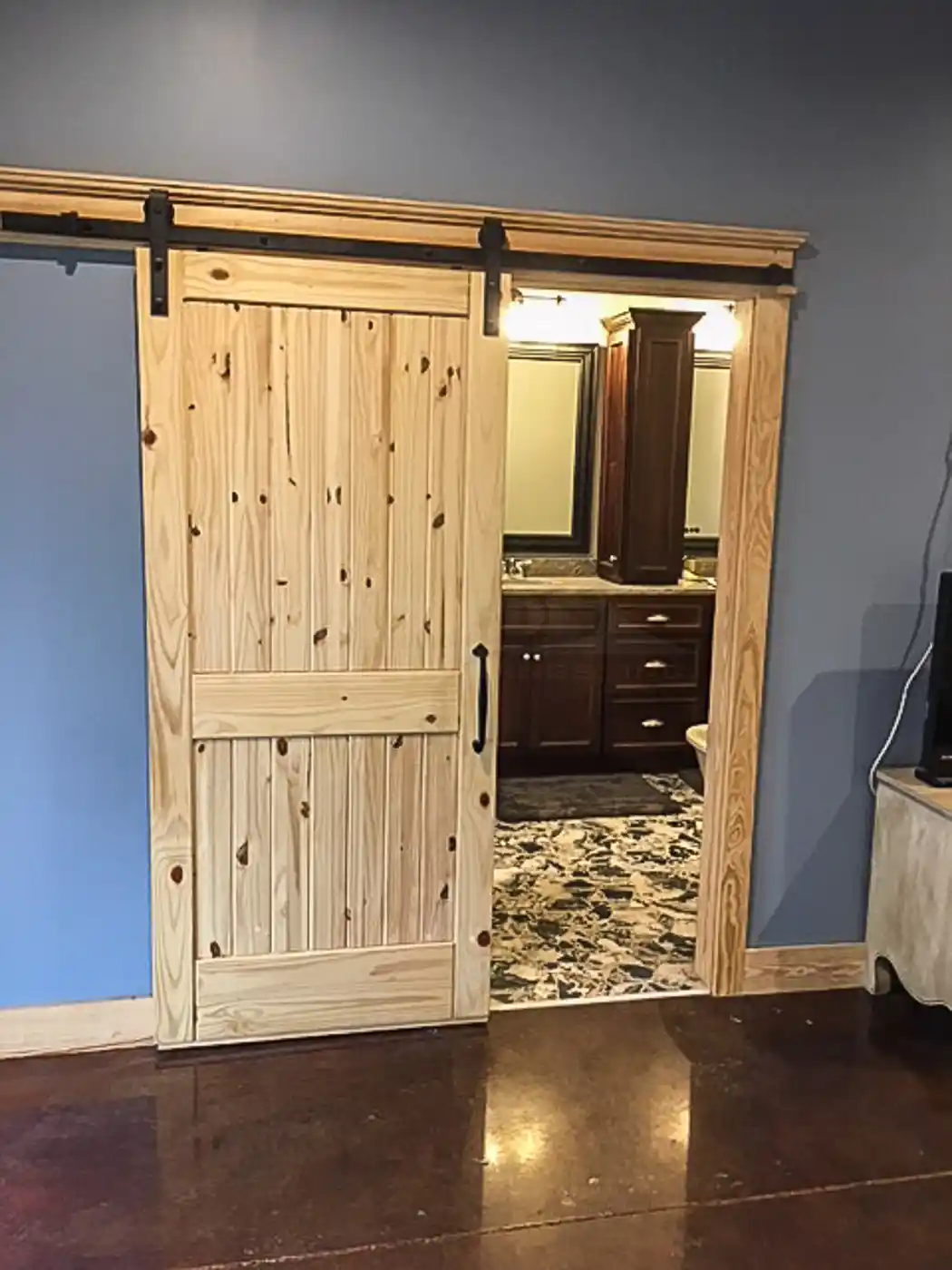 barndominium interior bathroom sliding door