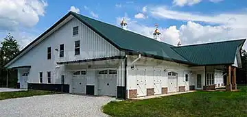 steel building barndominium, white with green roof
